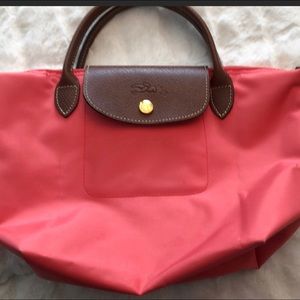 Mini longchamp bag . Slightly used,Great condition